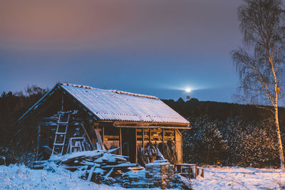 Log cabin in winter