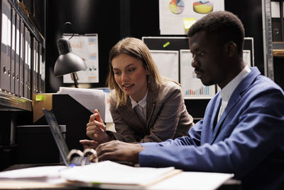 Business colleagues working in office