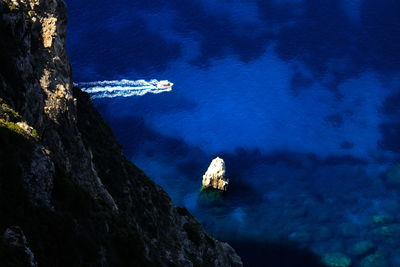 High angle view of sailboat in sea