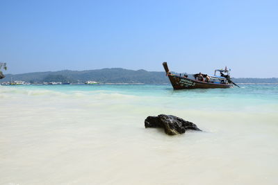 Scenic view of sea against clear sky