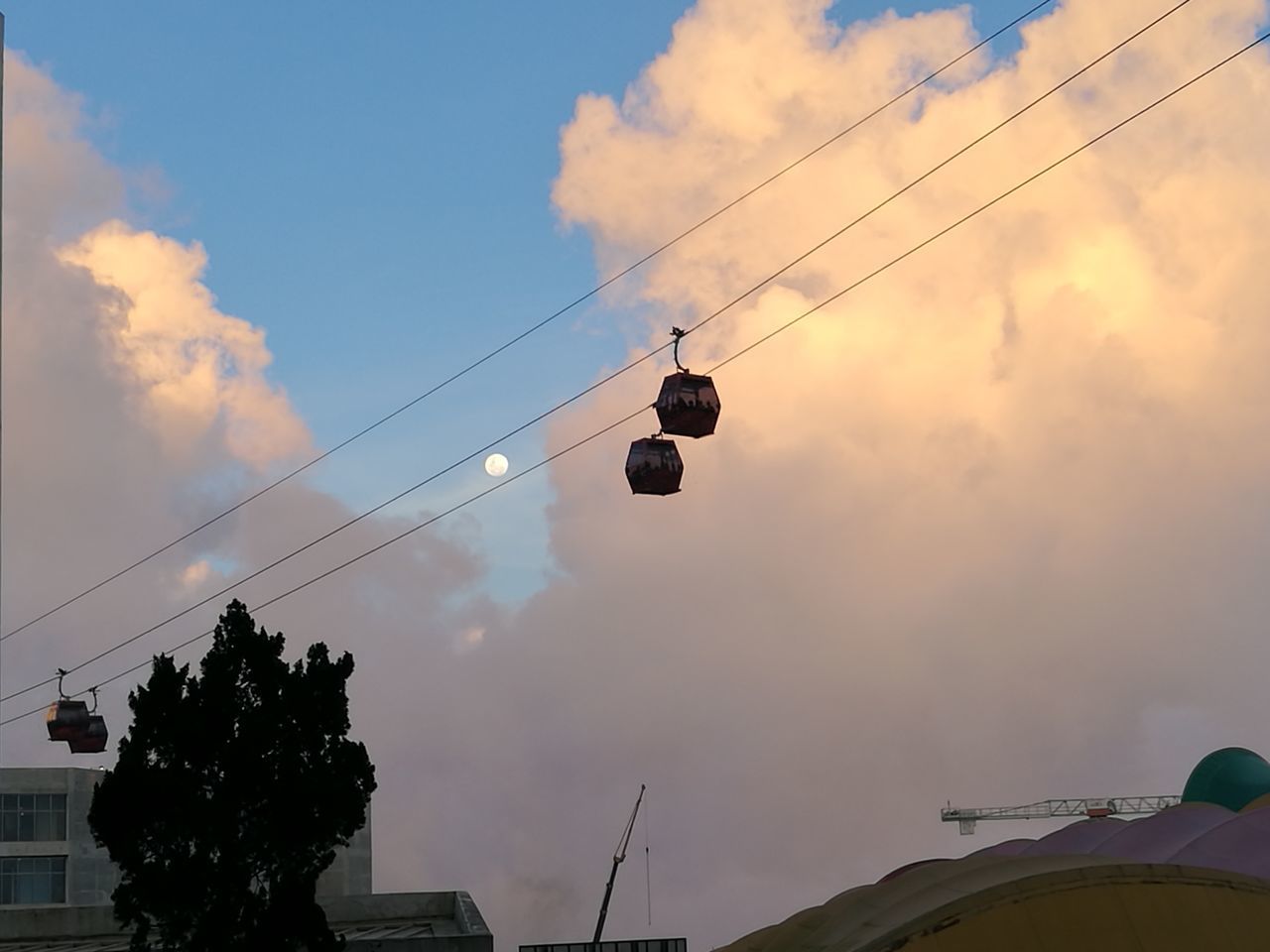 cable, sky, power line, cloud - sky, power supply, electricity, low angle view, transportation, outdoors, electricity pylon, sunset, no people, technology, connection, silhouette, overhead cable car, day, telephone line, ski lift, nature, red light