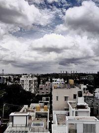 High angle view of buildings against sky