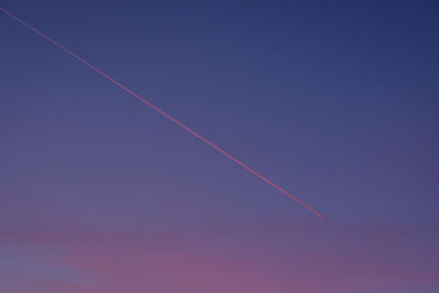 Low angle view of vapor trail in sky