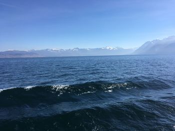 Scenic view of sea against blue sky