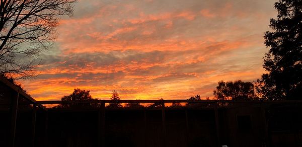 Scenic view of dramatic sky during sunset