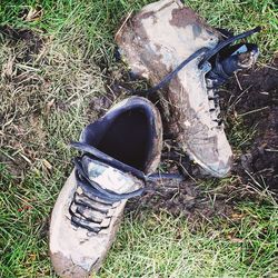 High angle view of shoes on field