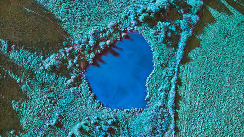 Arial shot of a small pond somewhere in the catskills region