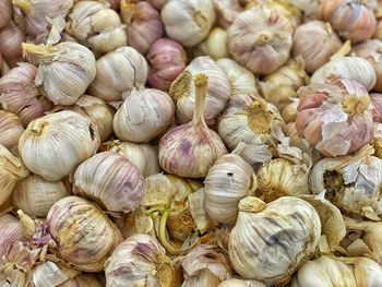 Full frame shot of onions for sale in market