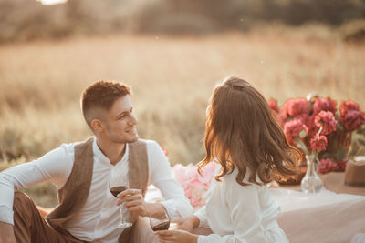 Couple holding flowers