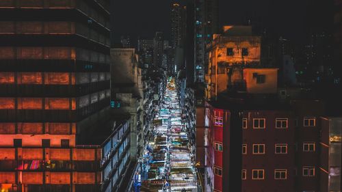 Buildings in city at night