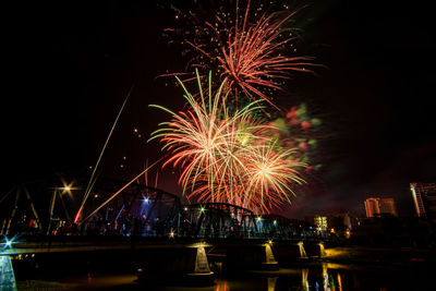 Firework display at night