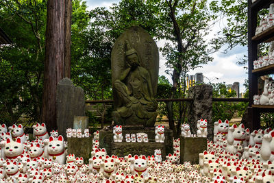 View of buddha statue in cemetery