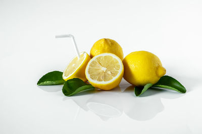 Close-up of fruits against white background