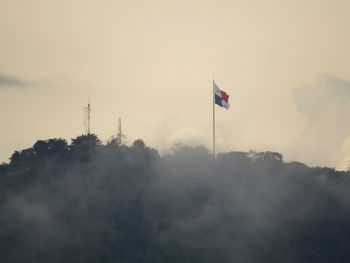 Low angle view of flag against sky