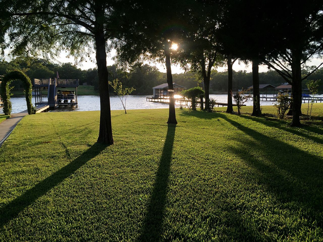 Sun setting behind the boat house.