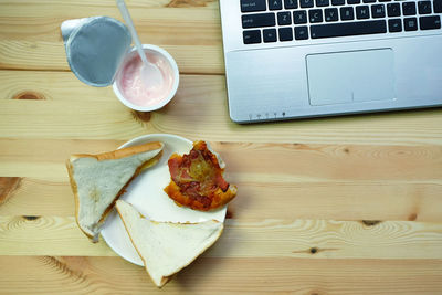 High angle view of breakfast served on table