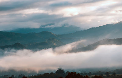 Scenic view of mountains against sky during sunset