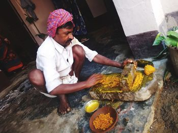 Full length of man preparing food