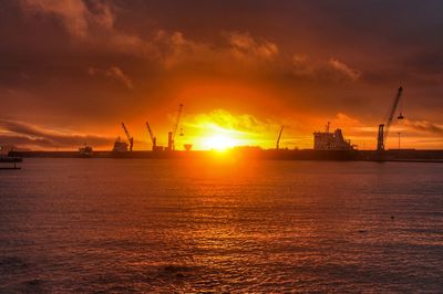 Scenic view of sea against sky during sunset