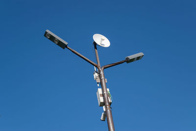 Low angle view of street light against clear sky