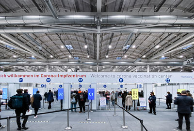 Group of people walking in airport