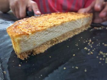 Close-up of man preparing food