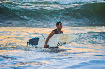 Man surfing in sea