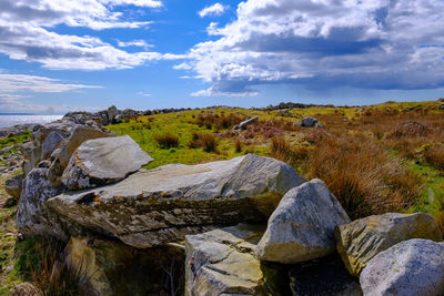 Rocks on land against sky