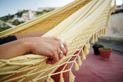 Low section of woman ring and amaca