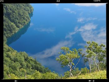 Scenic view of landscape against cloudy sky