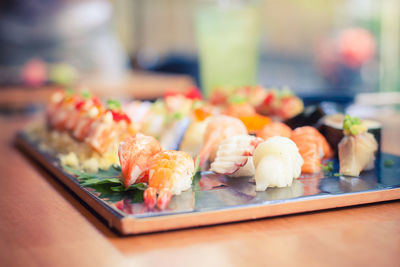 Close-up of sushi served on table