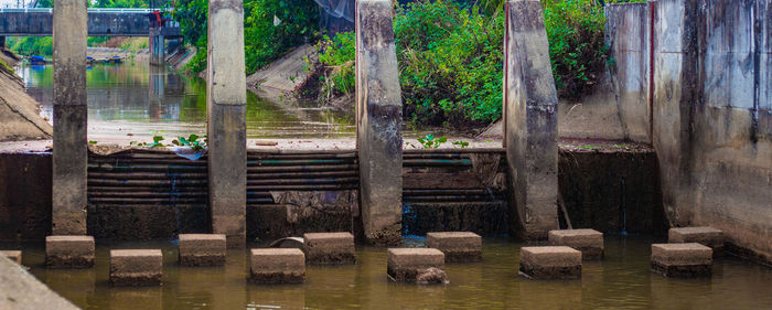 Abandoned building by lake