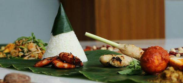 Close-up of food on banana leaf