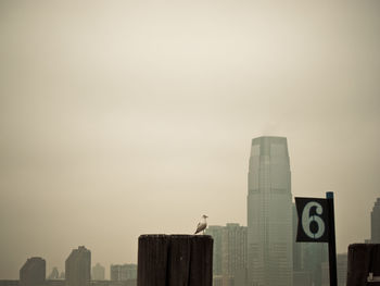 View of city buildings against sky