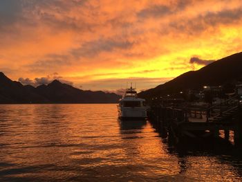 Scenic view of sea against orange sky