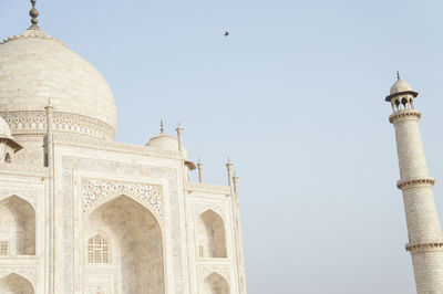 Low angle view of historic building against clear sky - taj mahal