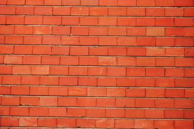 Full frame shot of red brick wall