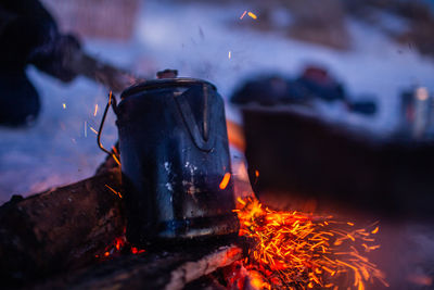 Close-up of fire burning at night