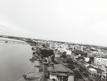 Panoramic view of buildings and sea against sky