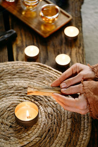 Midsection of man preparing food on table