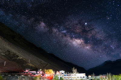 Scenic view of star field against sky at night