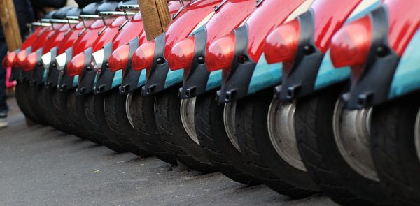 Motor scooters in parking lot