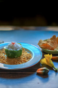 Close-up of cake served on table