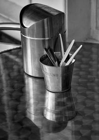 Close-up of paintbrushes on table