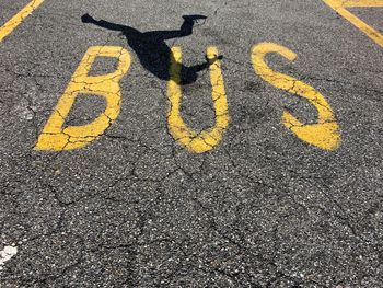 High angle view of yellow text on road