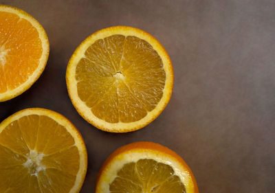 Close-up of oranges against orange background