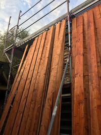 Low angle view of construction site against sky