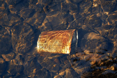 High angle view of illuminated light on land during sunset