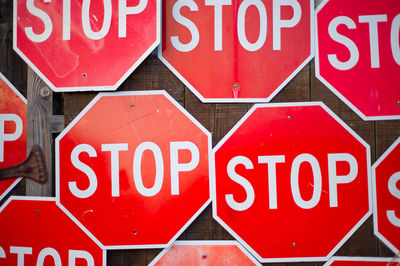 Stop sign on wooden wall