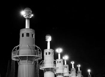 Low angle view of illuminated building against sky